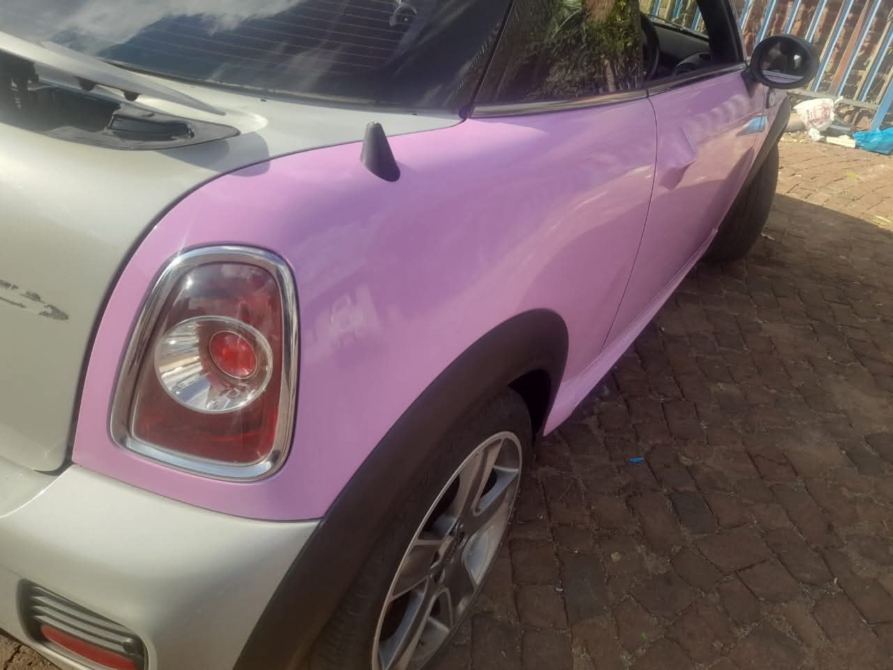 Pink and White Color Change Vehicle Wrap - Custom Car Transformation