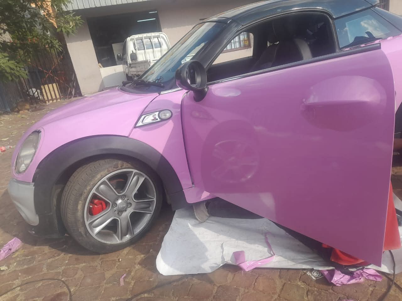 Pink Color Change Wrap - Detailed View of Custom Vehicle Transformation