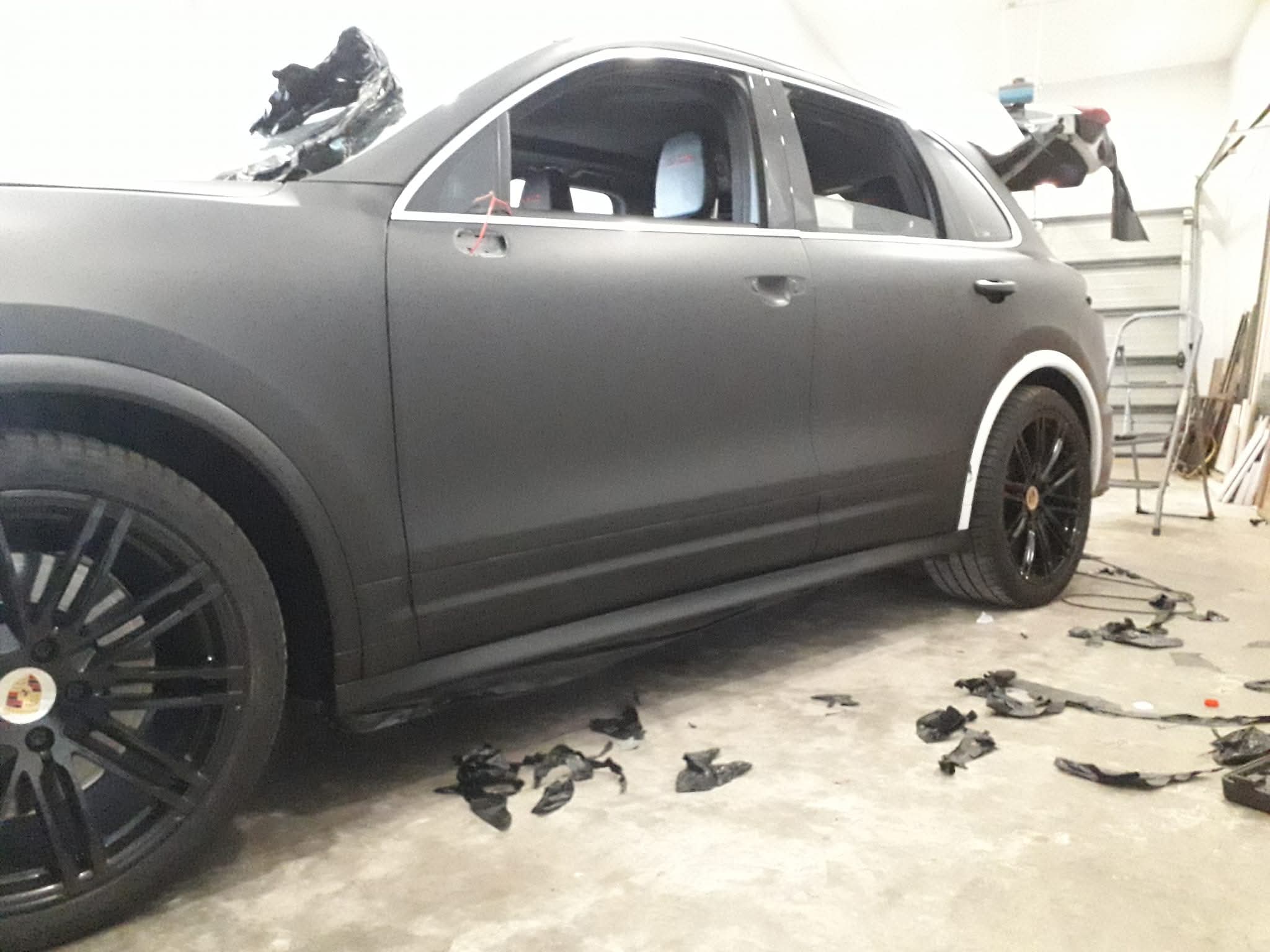 Matte Black Porsche Vehicle Wrap - Premium Sports Car Luxury Transformation